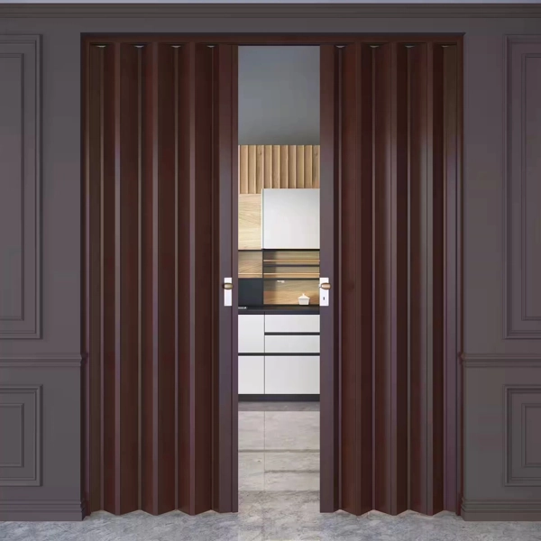 Brown PVC accordion doors partially open to a kitchen