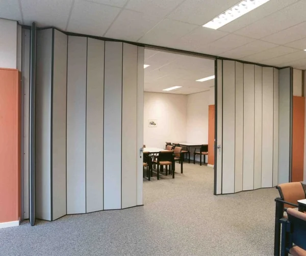 Grey PVC folding door in an office setting