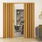 Oak accordion doors opening into a dining area.