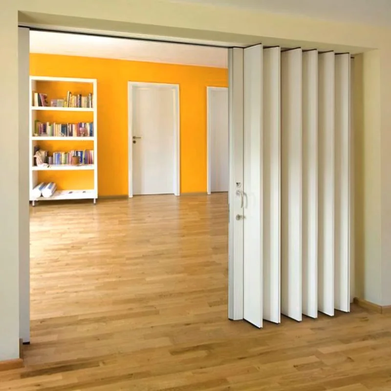 White PVC folding door leading to a bright orange room